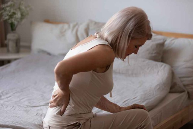 Woman With Back Pain